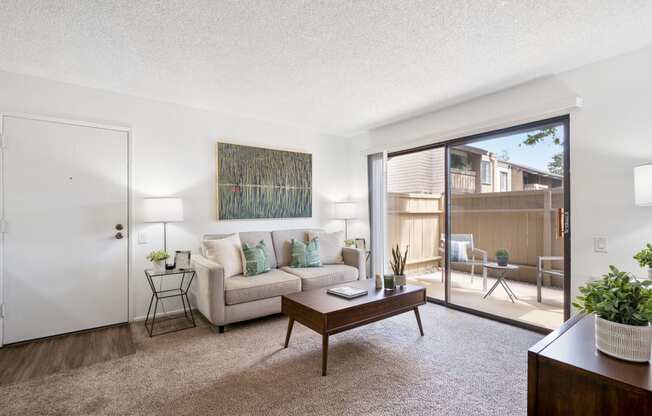 a living room with a couch and a coffee table