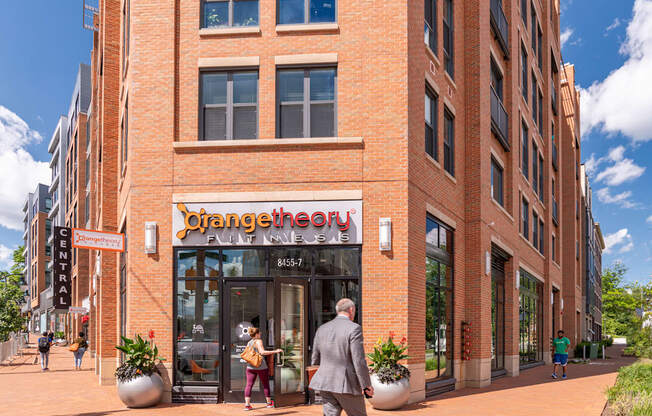 A red brick building with a sign that says