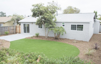 FULLY REMODELED HOME WITH 2 CAR GARAGE, ENCLOSED BACKYARD, WASHER/DRYER & A/C!!