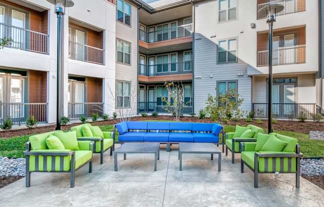 the preserve at ballantyne commons apartments clubhouse with couches and chairs