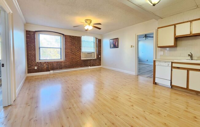 Loft style condo with 2bed 1.5bath, elevator building with parking.