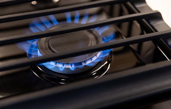 Gas stove with burner on