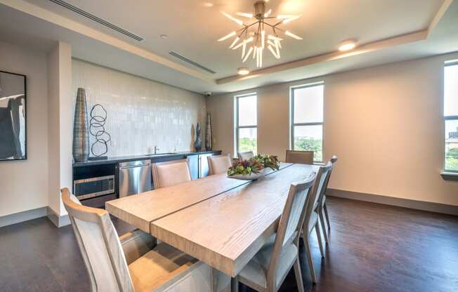 Resident conference area facing a refrigerator and decorative lighting