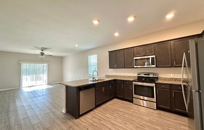 Spacious 4 Bed, 2 Bath with 2 Car Garage & More in Gator Circle!