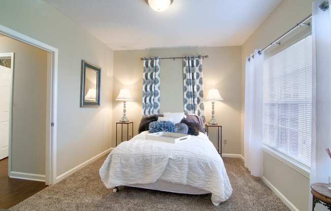 Enclave at Wolfchase Apartments in Cordova Tennessee photo of bedroom with plush carpeting