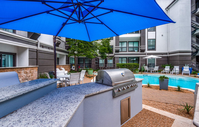 our apartments have a pool and a bar with a grill