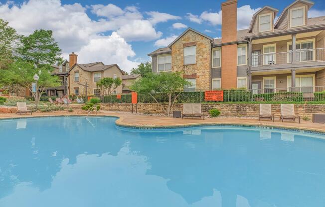 a large pool of water in front of a building