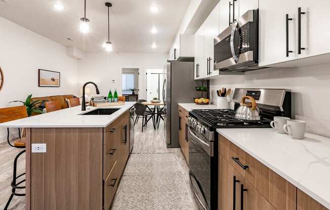 an open kitchen with a dining area