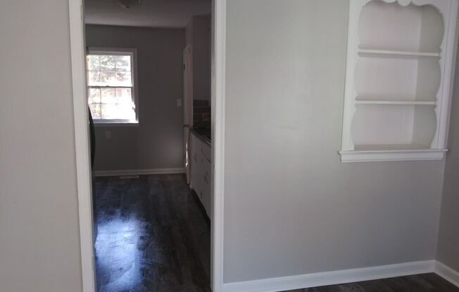 3br 1.5 bath, NEWLY RENOVATED! Garage, fenced back yard, plank flooring
