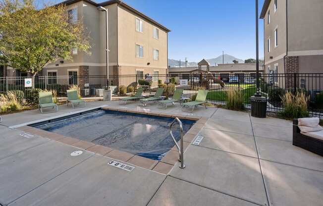 our apartments have a resort style pool with lounge chairs