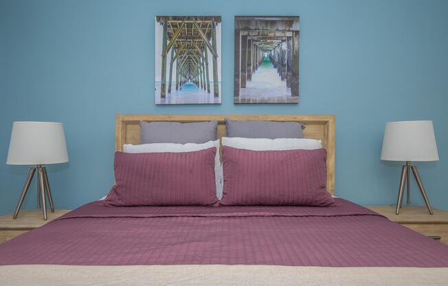 a bedroom with a bed in a room