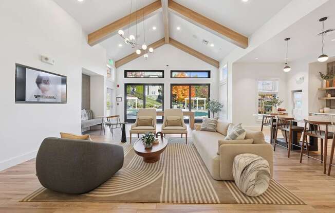 A living room with a large couch and a coffee table.