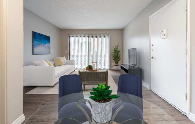 Virtual staged furnished dining room and living room