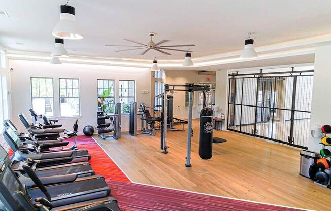 Professional fitness studio with virtual training and yoga/Pilates zone