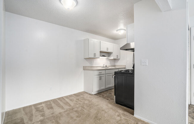dining area leading into a kitchen at Apple Ridge Apartments, Michigan, 49534