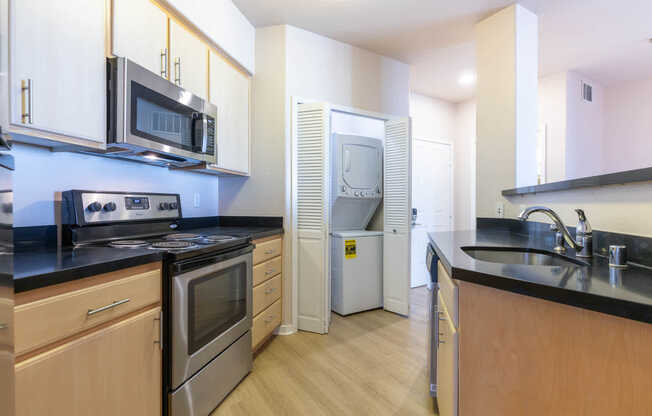 Kitchen with In-home Washer and Dryer