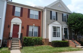 Brick front townhouse with all fresh interior paint and new carpet