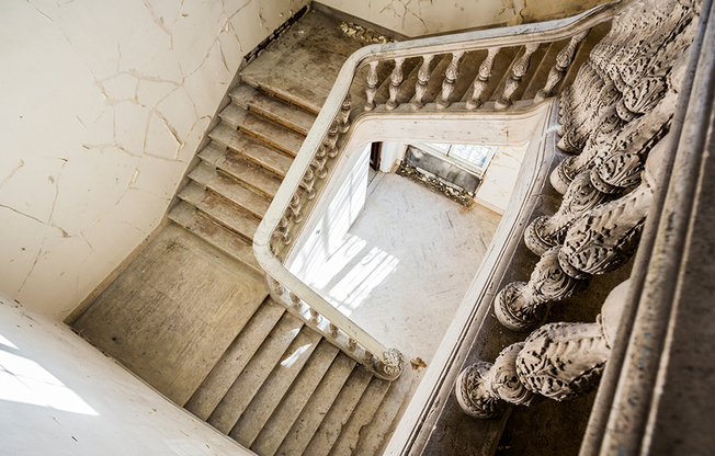 Before: Original ornate staircase from 2nd level looking down.  You'll feel the history at Modera Sedici!