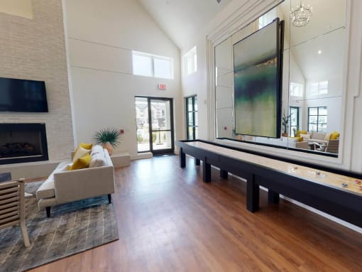 a blurry image of a living room with a table and chairs
