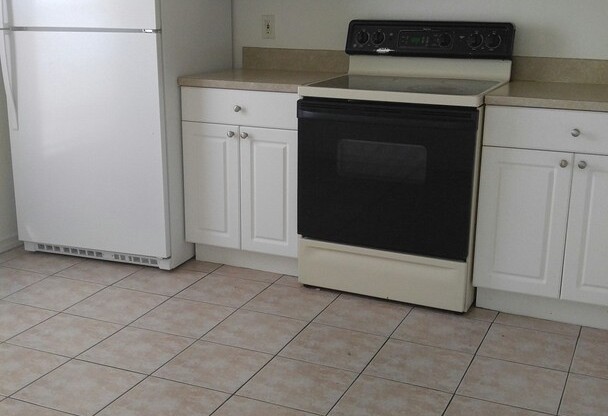 Spacious 2/2 with garage in family neighborhood