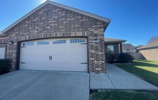 This Gorgeous All Brick and Stone Patio Home is located in Nixa!