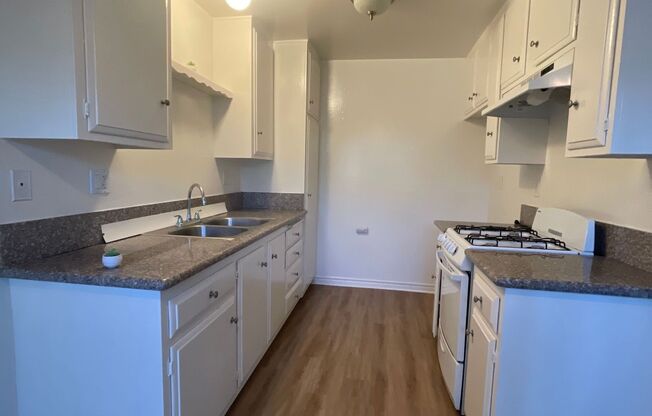 Upstairs 2 Bed 1 Bath, 1 Assigned Parking Space Included, 1.5 Miles From the Beach