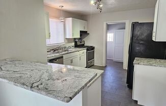 Gorgeous 2 bedroom in Barelas! Great location. Washer/Dryer. 1 car garage.