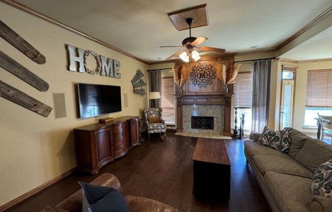 Executive Living in Moore Schools! 3 bedrooms plus office or 4th bed, covered patio and Storm shelter!