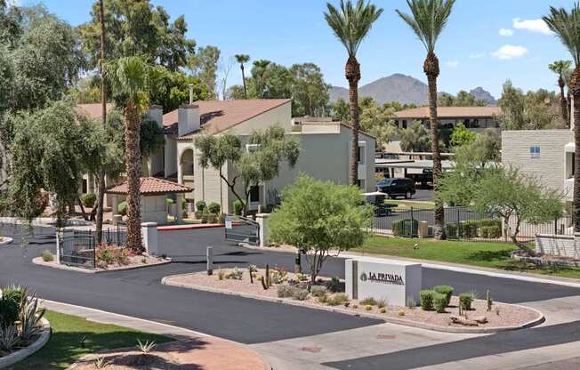 A residential area with a sign that reads