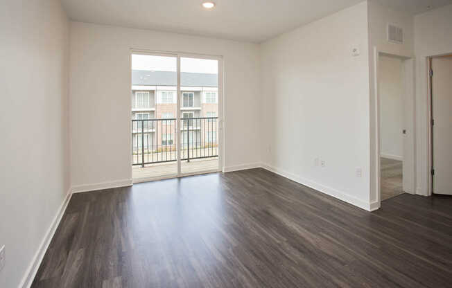 Living Room with Balcony and Hard Surface Flooring