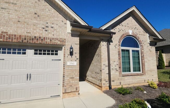 One Level Townhouse with a Double Garage!