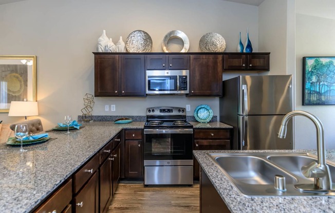 Kitchen wide view with cabinets at The Cantera by Picerne, Nevada