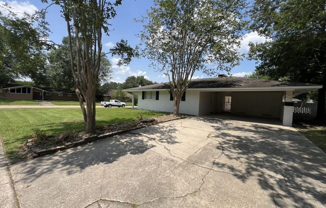Welcome to 10444 Browning Dr. in the sought-after Broadmoor neighborhood!