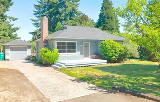 Adorable Hazelwood Bungalow on Secluded Road with Detached Garage, Expansive Basement and Yard