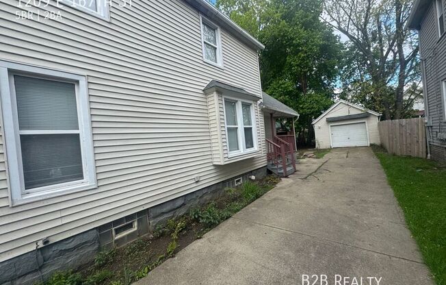 1209 E 167 ST