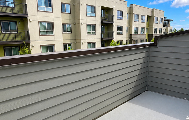 Spacious 1,893 SF Bellevue Townhome with Top-Floor Loft Suite & Private Rooftop Deck