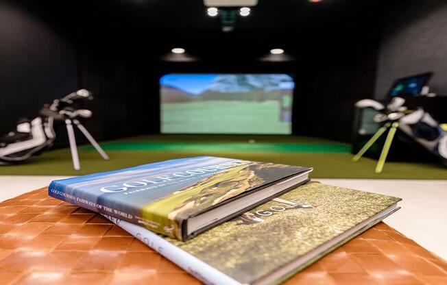 a book sitting on top of a table in front of a video game