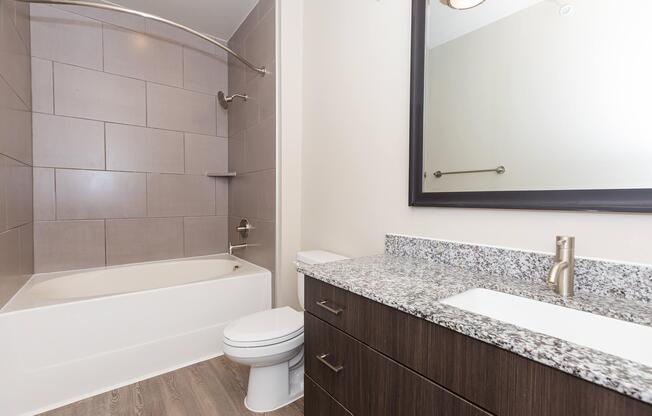 a double sink and large mirror