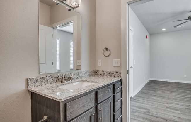 Bathroom With Granite Vanities