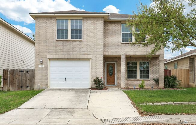 Two-Story Retreat with Modern Amenities and Convenient Access