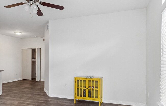 Living room with ceiling fan at Tidwell Estates in Houston TX