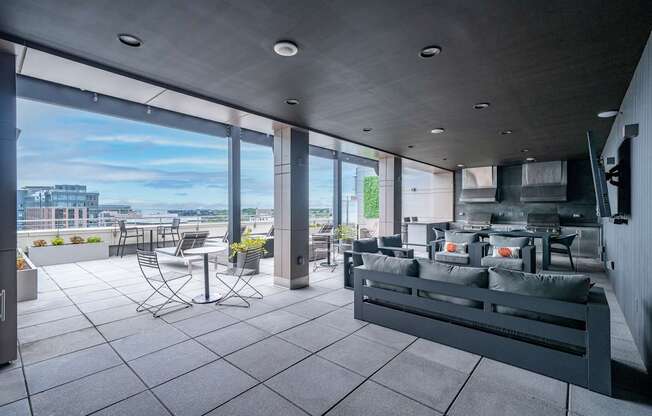 A modern living room with a view of the city.