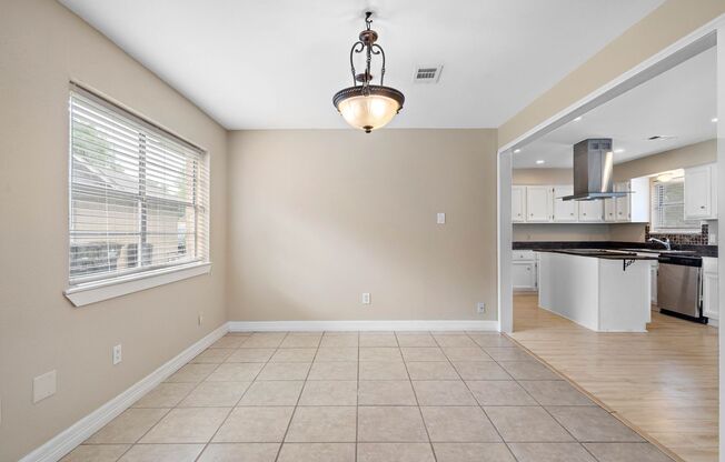 Lovely 3 bedroom 2 bath w/ potential 4 bedroom or game room. Full Privacy fence backyard with large patio!