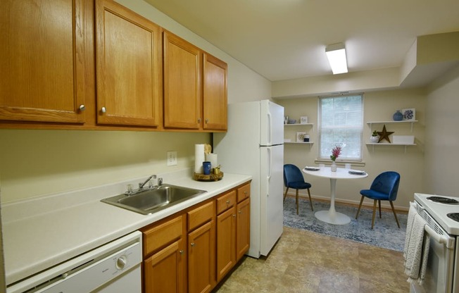 Kitchen with Ample Storage at Woodridge Apartments, Randallstown, MD