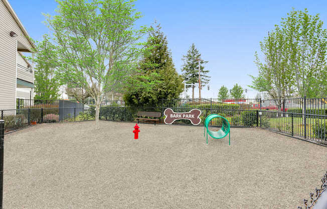 Community Dog Park with Agility Equipment at Landings at Morrison Apartments located in Gresham, OR.