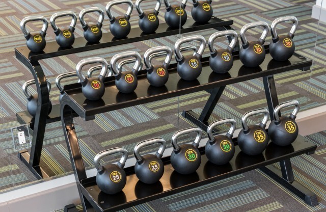 Free weights in Community Fitness Center | Tinsley on the Park | Houston Apartments