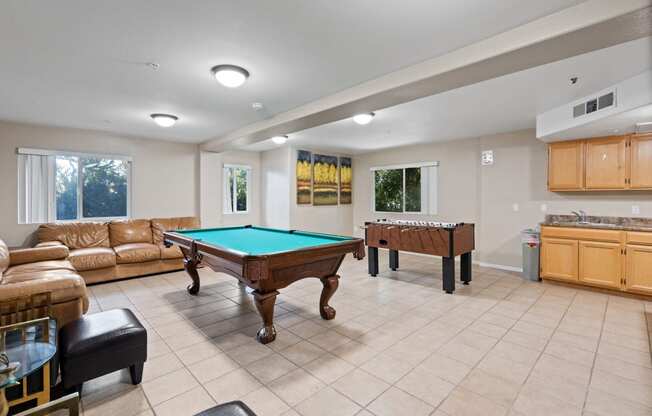 a game room with a pool table and two billiards at Dronfield Astoria California, 91342