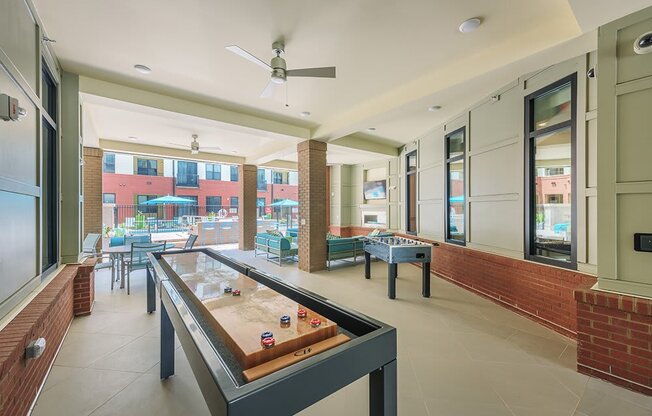 Game Room With Shuffle Board at The Lincoln Apartments, Raleigh