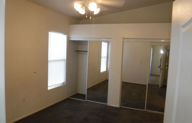 SECOND STORY CONDO IN GATED COMMUNITY WITH ACCESS TO POOL/SPA
