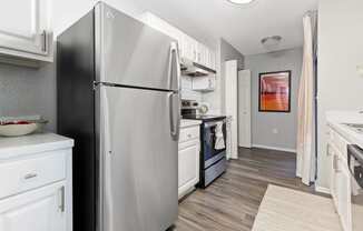 Kitchen at Northgreen at Carrollwood Apartments in Tampa, FL